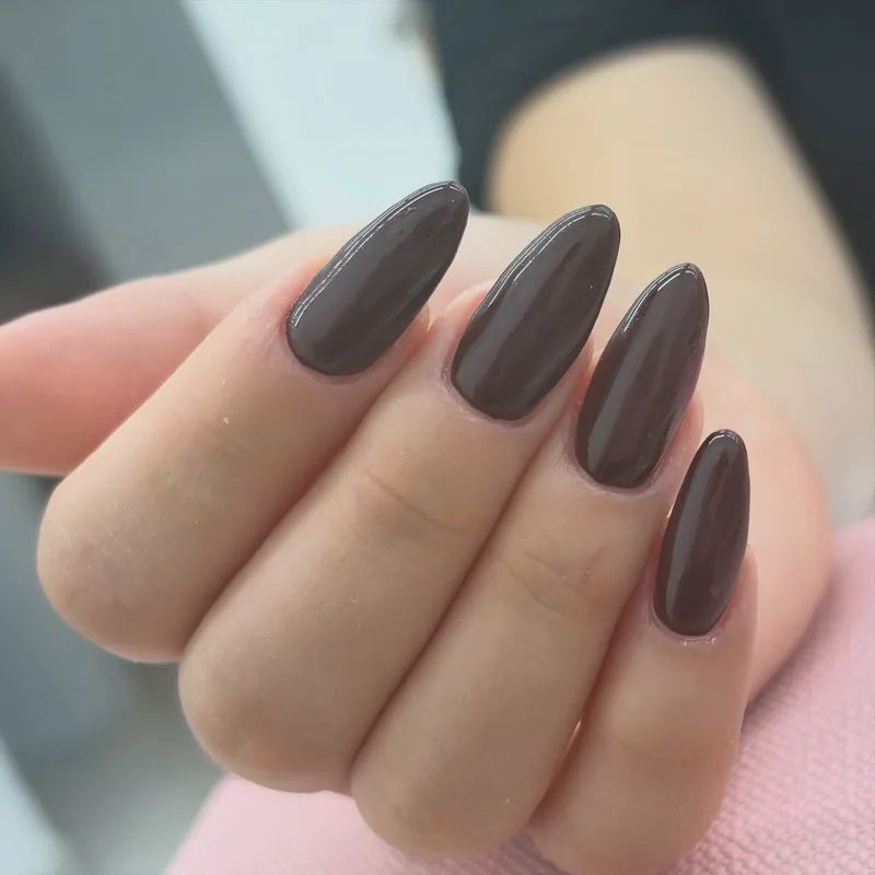 Deep brown almond nails