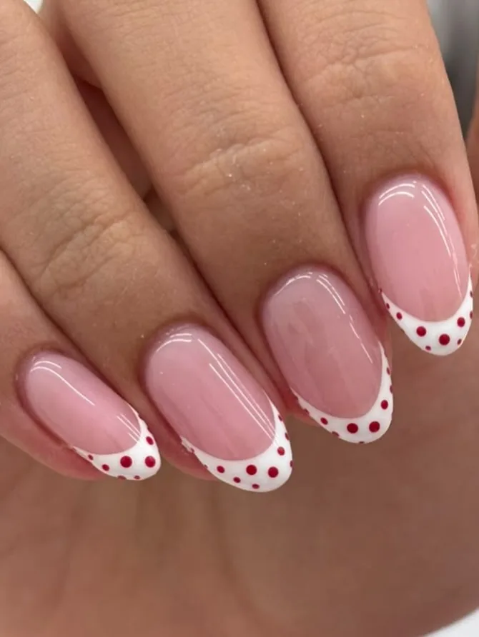 Short French tips with coloured dots
